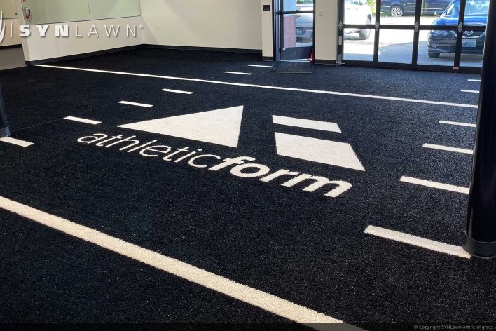 SYNLawn Pittsburgh PA prefab turf logos for athletic weight room applications